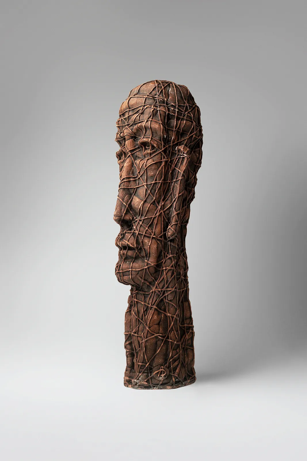 Image of Wise by Liudmyla Davydenko, size: 50х15х15, made of chamotte, glaze, Sculpture medium, part of the Holova/Head series, priced at €1000 Photo 2 of 3.
