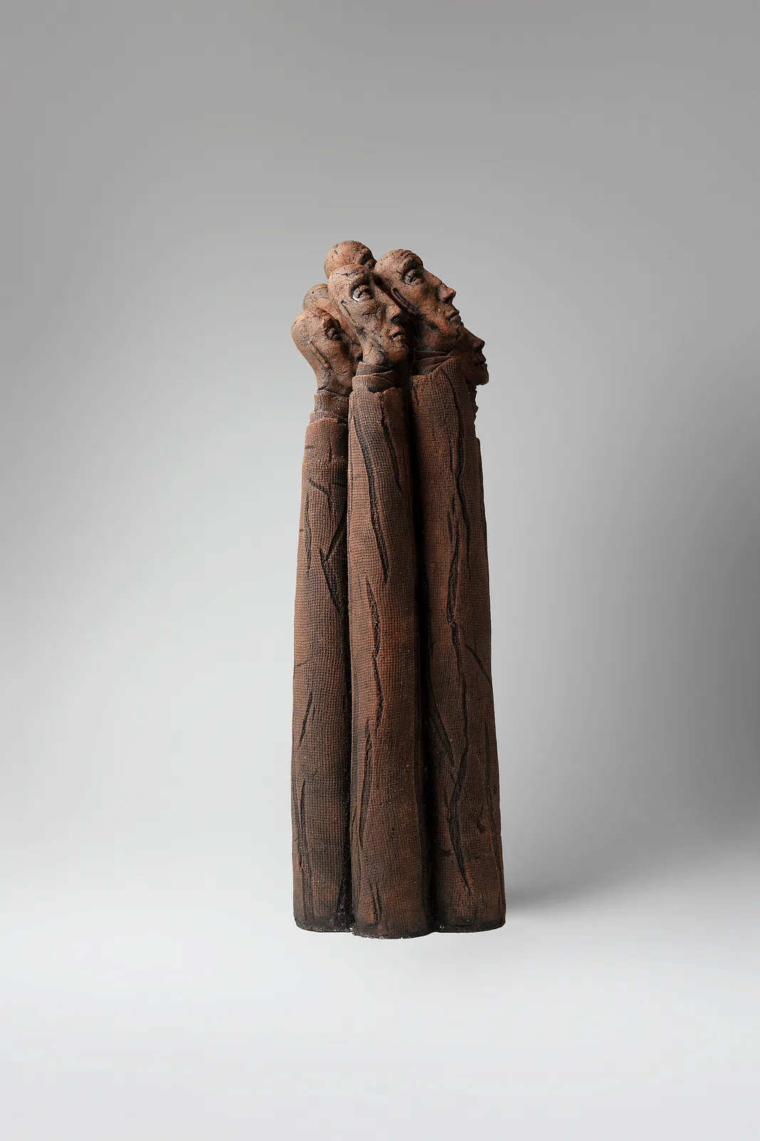 Image of One whole by Liudmyla Davydenko, size: 49x18x15, made of chamotte, glaze, Sculpture medium, part of the Holova/Head series, priced at €1000 Photo 3 of 4.