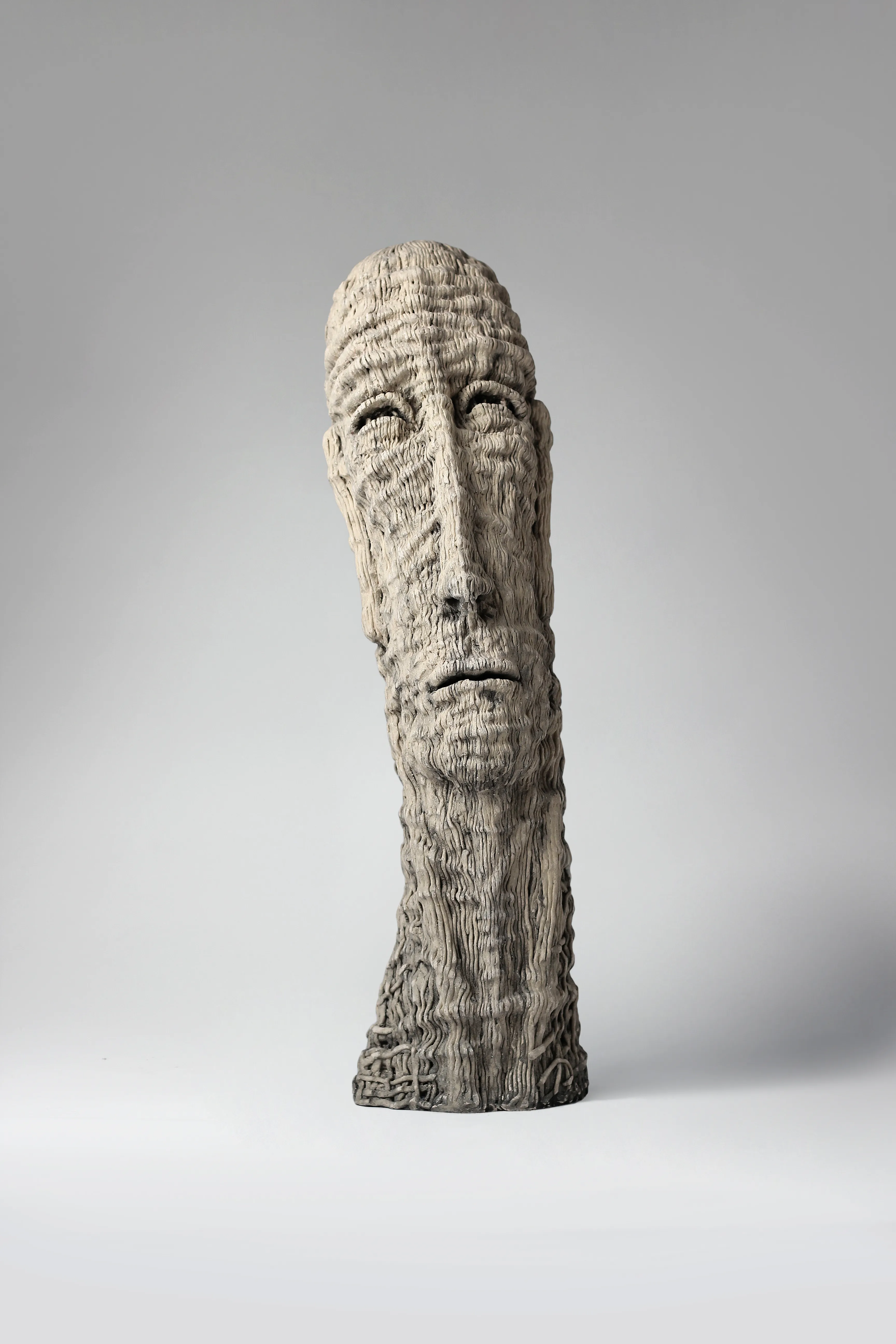Image of Up by Liudmyla Davydenko, size: 54х15х17, made of chamotte, glaze, Sculpture medium, part of the Holova/Head series, priced at $1000