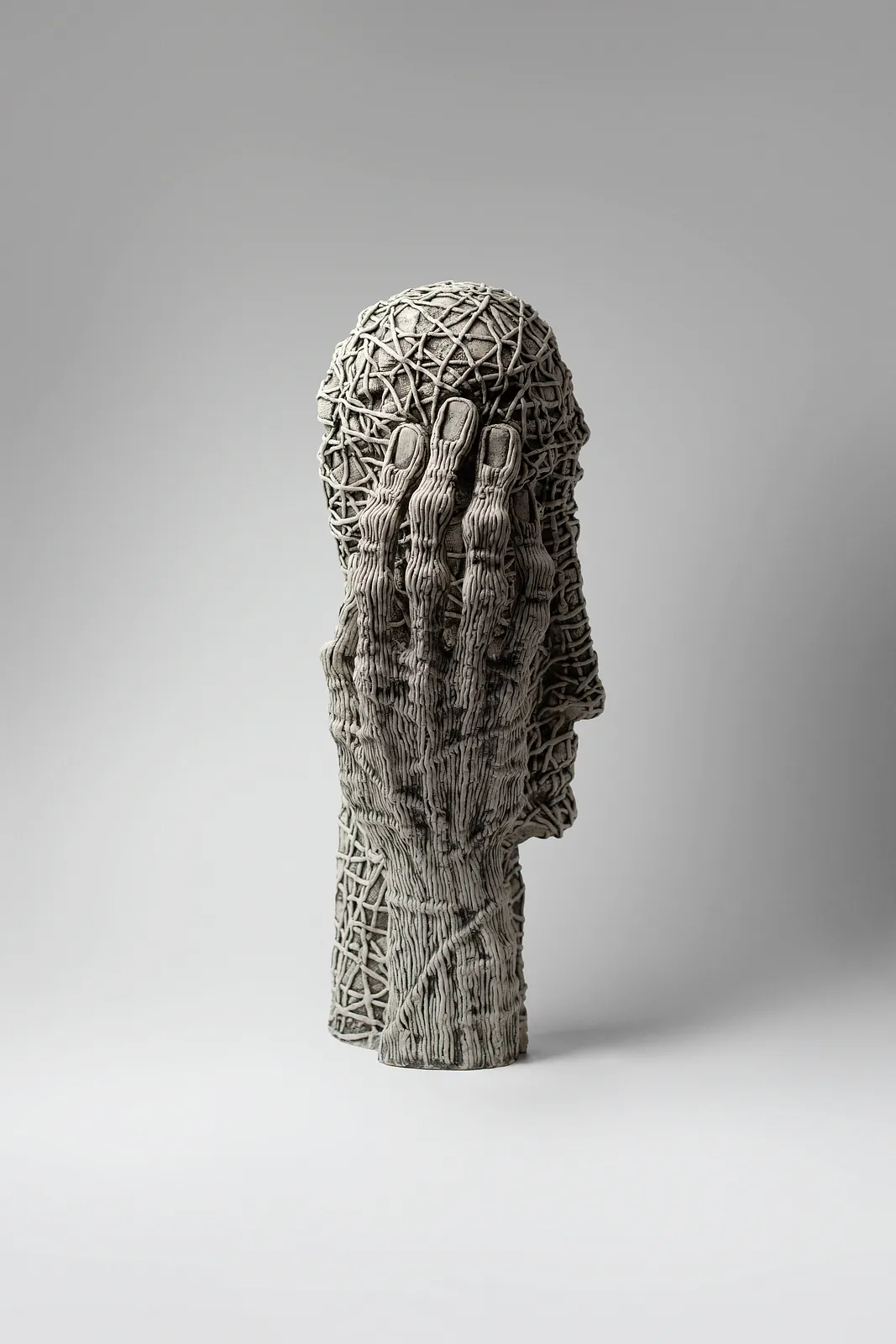 Image of To admit by Liudmyla Davydenko, size: 46х22х17, made of chamotte, glaze, Sculpture medium, part of the Holova/Head series, priced at €1200 Photo 3 of 4.