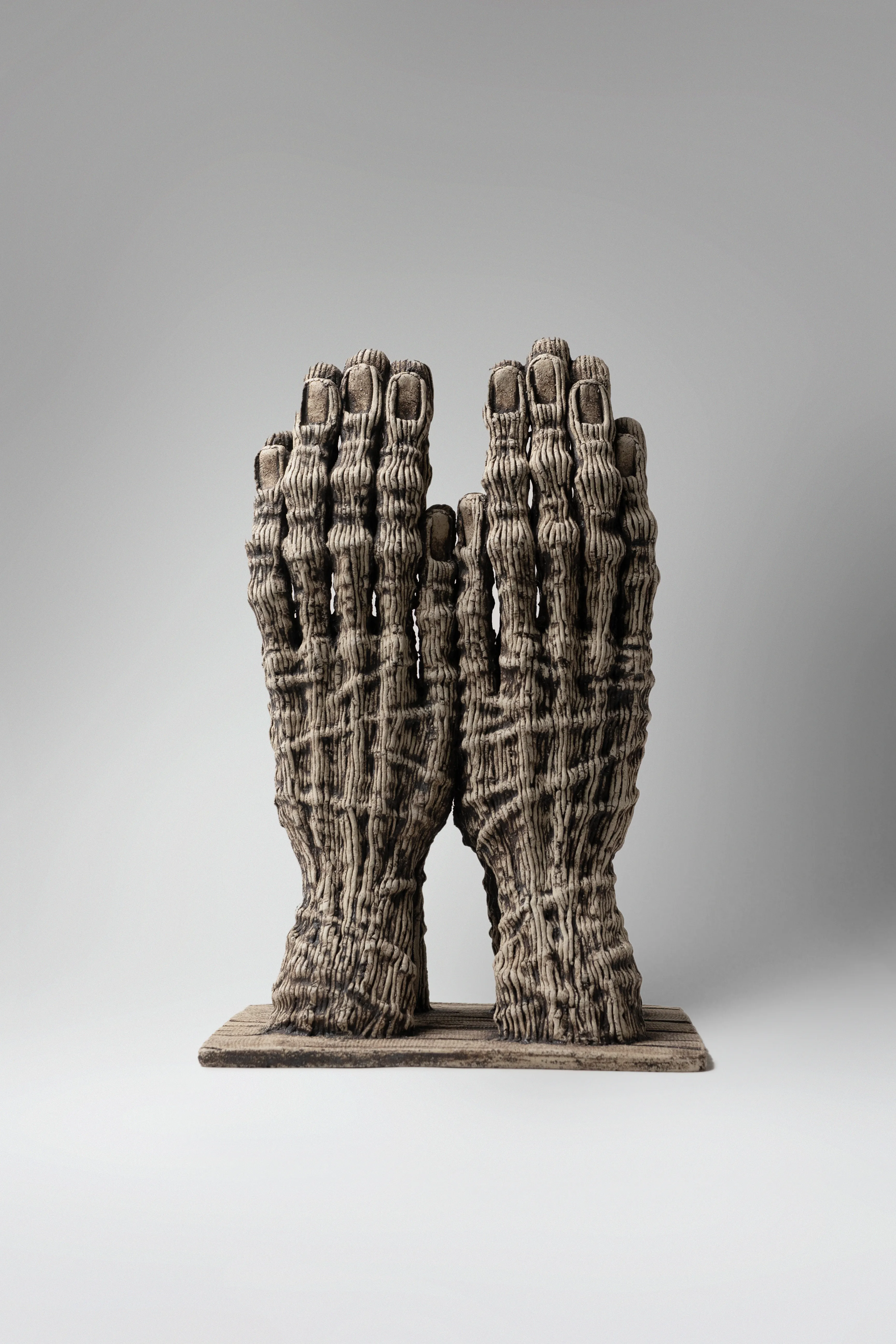 Image of Reunification by Liudmyla Davydenko, size: 37х23,5х18,5, made of chamotte, glaze, Sculpture medium, part of the Holova/Head series, priced at €700 Photo 2 of 3.