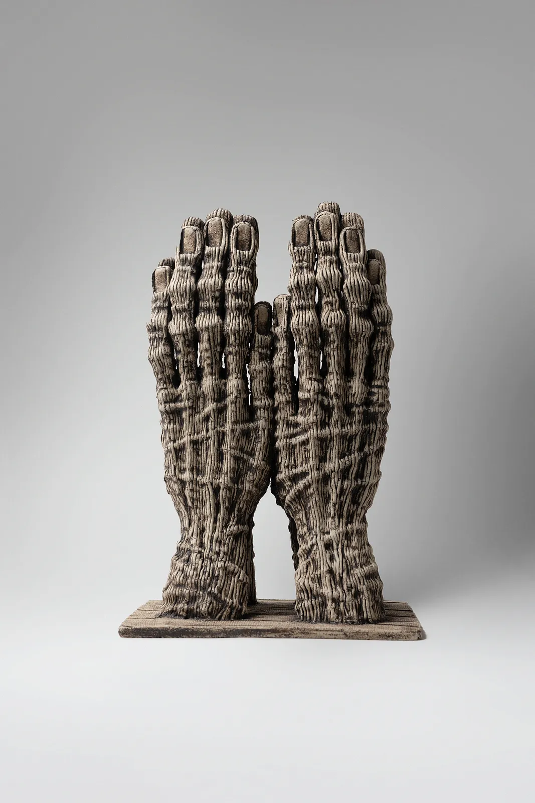 Image of Reunification by Liudmyla Davydenko, size: 37х23,5х18,5, made of chamotte, glaze, Sculpture medium, part of the Holova/Head series, priced at €700 Photo 2 of 3.