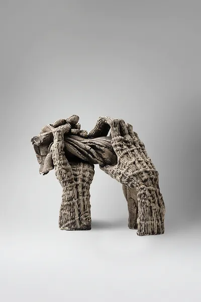 Image of To squeeze by Liudmyla Davydenko, size: 25х29х22, made of chamotte, glaze, Sculpture medium, part of the Holova/Head series, priced at €700 Photo 3 of 3.