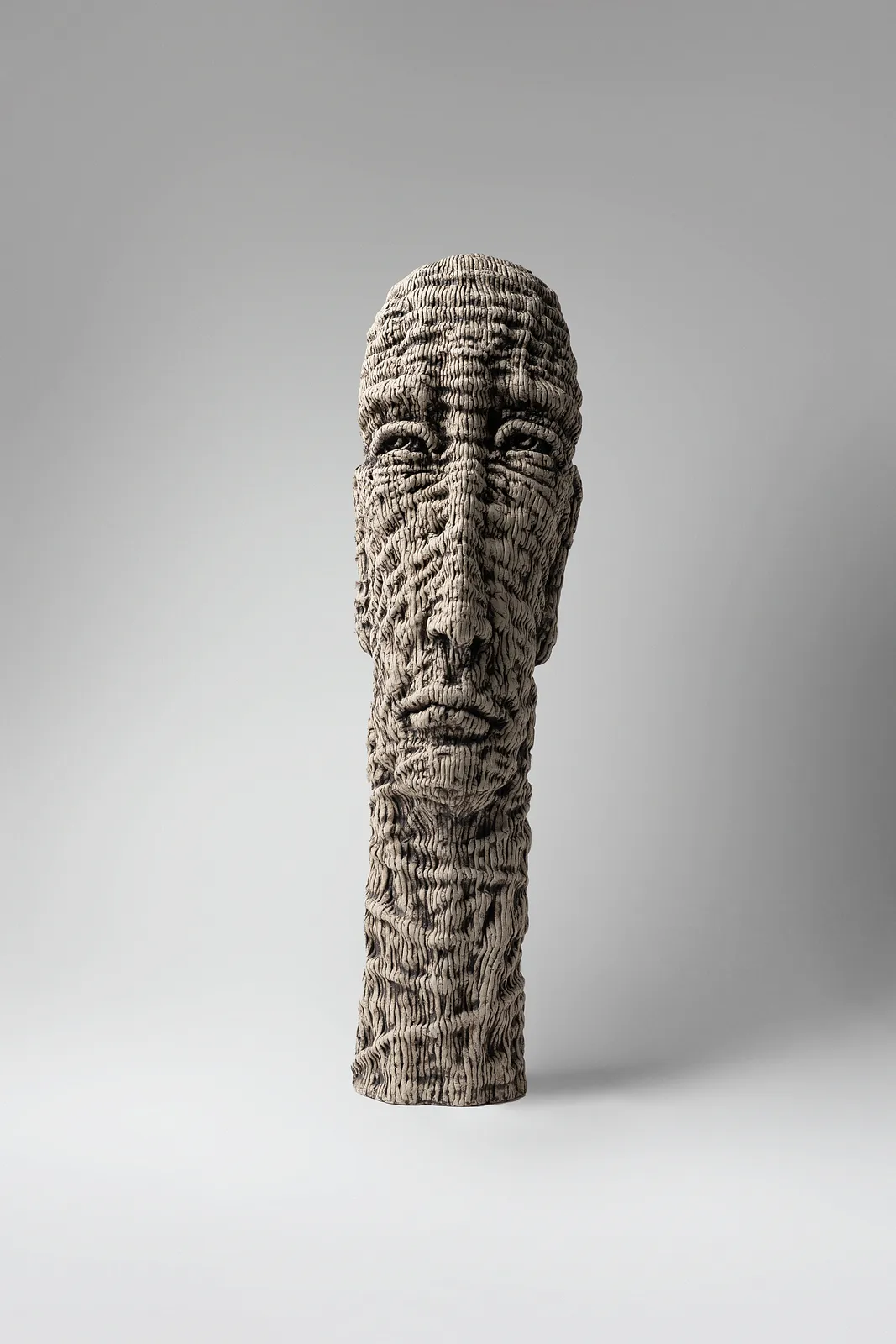 Image of View by Liudmyla Davydenko, size: 51х14х16, made of chamotte, glaze, Sculpture medium, part of the Holova/Head series, priced at €1000 Photo 1 of 3.